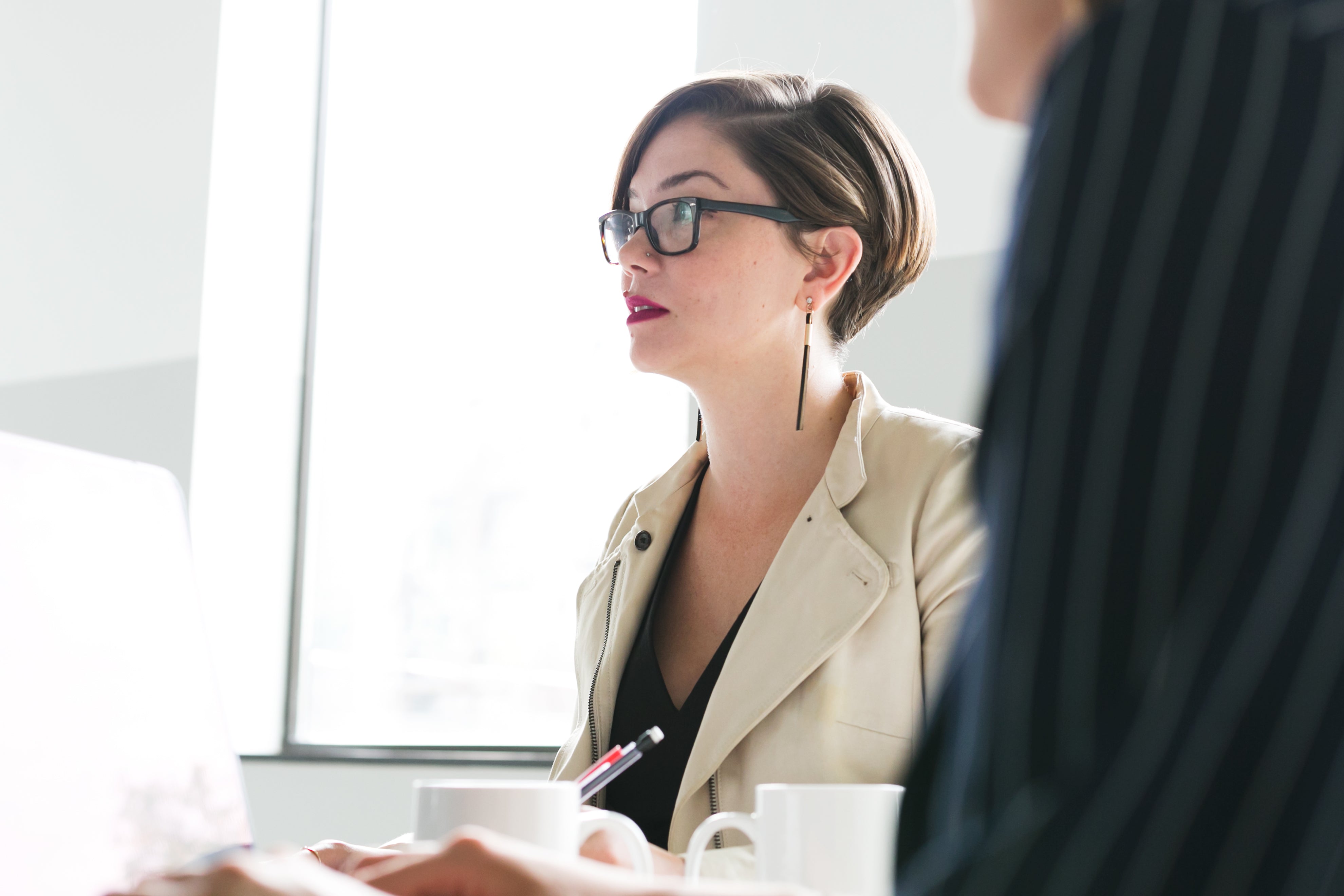 files/woman-in-glasses-at-meeting.jpg